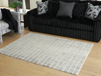 Signature Design by Ashley Turinwith 5'3" x 7' Area Rug - R407552
