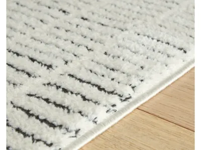 Signature Design by Ashley Turinwith 5'3" x 7' Area Rug - R407552