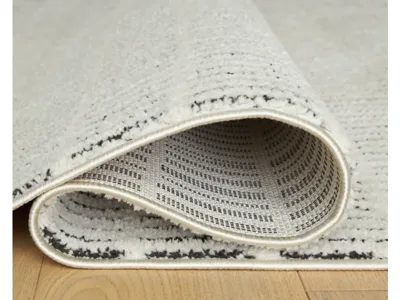 Signature Design by Ashley Turinwith 5'3" x 7' Area Rug - R407552